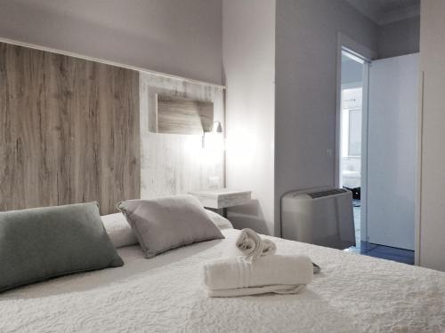 Postel nebo postele na pokoji v ubytování A casa di Noemi