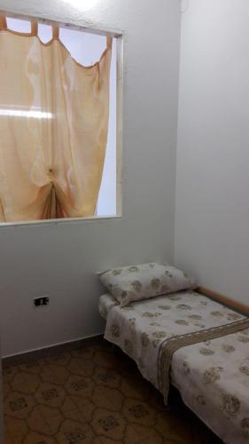 Ένα ή περισσότερα κρεβάτια σε δωμάτιο στο The Marchisio Apartment