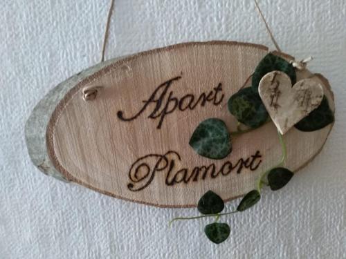 a wooden sign with the words agent pammont at Apart Waldegger in Nauders