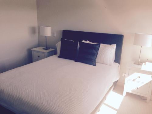 Katil atau katil-katil dalam bilik di Breakwater Apartment