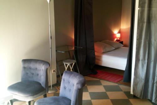 Voodi või voodid majutusasutuse Charmant studio Vieux Mans / centre toas
