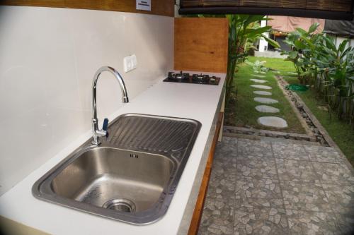 Κήπος έξω από το Bali Mynah Villas Resort