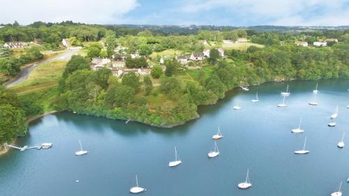 an aerial view of a river with boats in it at VVF Lac d'Eguzon in Éguzon-Chantôme