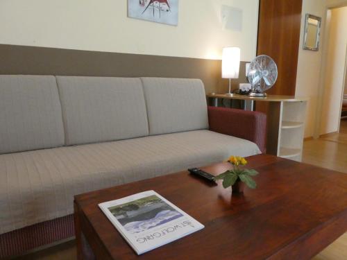 a living room with a couch and a coffee table at Haus Daheim in St. Wolfgang
