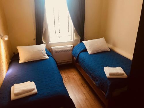מיטה או מיטות בחדר ב-Villa Miramare , Dobrota seafront