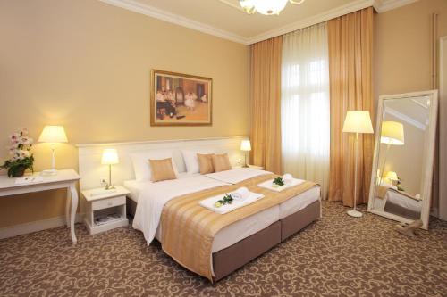 Cama o camas de una habitación en Booking Rooms