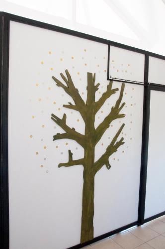 a tree painted on a wall with a basketball hoop at Fairway Villas, A Terra Lusso Property in Gialova