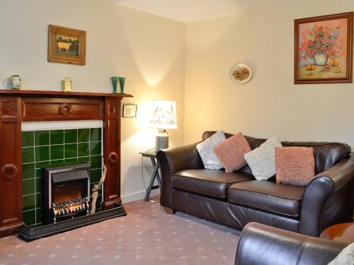 A seating area at Woodbine Cottage 