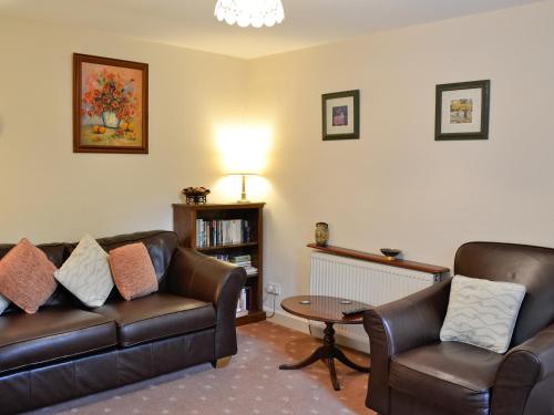 A seating area at Woodbine Cottage 