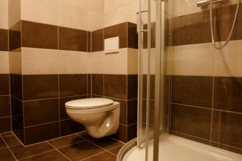 Kúpeľňa v ubytovaní Apartament Jedynka