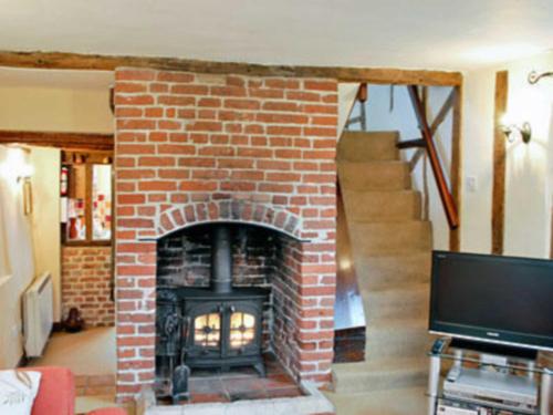 A television and/or entertainment center at Ivy Cottage 