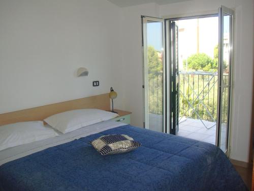 A bed or beds in a room at Residence e B&B La Cappella Del Convento