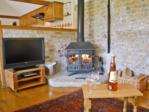 A television and/or entertainment center at Monks Barn 