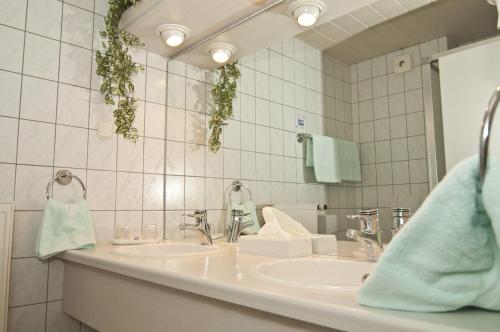 Koupelna v ubytování Hotel Hansa