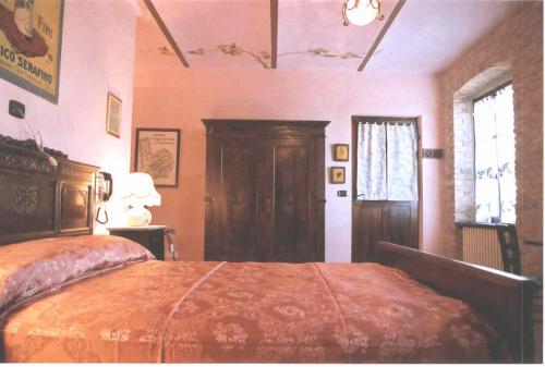 Cama ou camas em um quarto em La Briccola
