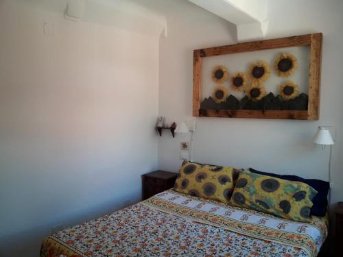 A bed or beds in a room at La Casa nel Borgo