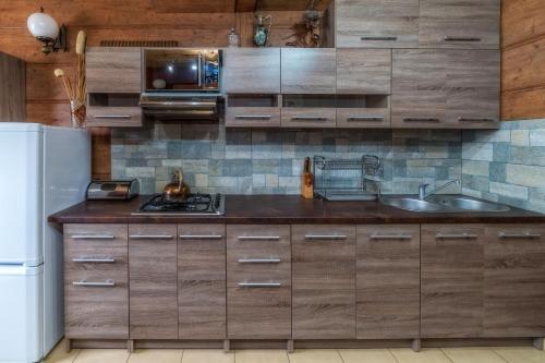 Kuchyň nebo kuchyňský kout v ubytování Apartamenty i Domki Taterka