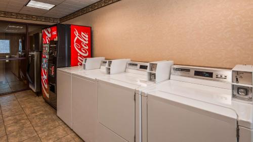 a row of washers and dryers in a store at Best Western Plus Flathead Lake Inn and Suites in Kalispell