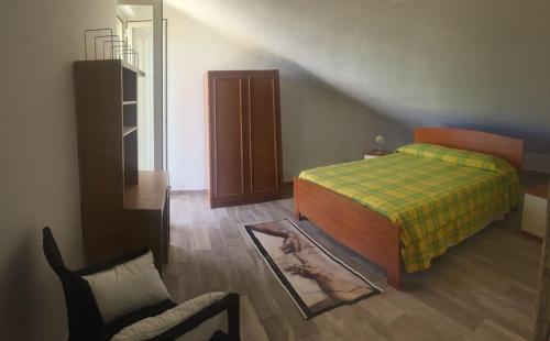 A bed or beds in a room at Casa Daniela