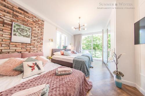 Posteľ alebo postele v izbe v ubytovaní Family Luxury Pure Old Town Apartament 1-8, 2 sypialnie i salon, parking pub, 60m2