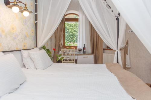 Кровать или кровати в номере Hotel Nata