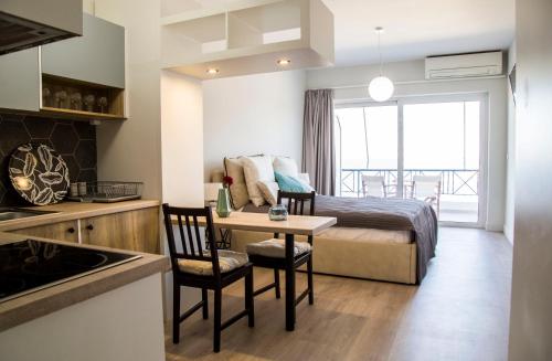 Kuchyň nebo kuchyňský kout v ubytování Tolo sea view