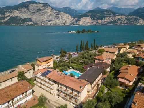 an aerial view of a resort by the water at Hotel Villa Isabella in Brenzone sul Garda