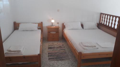 Katil atau katil-katil dalam bilik di Ambeles Apartments