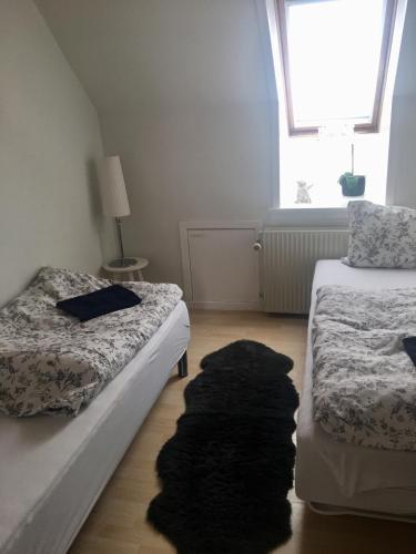 Postel nebo postele na pokoji v ubytování AD Apartment