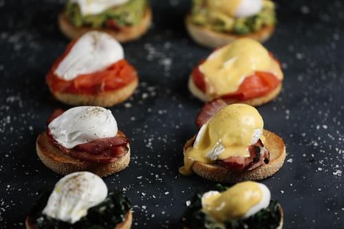 a group of mini sandwiches with ice cream and tomatoes at Malmaison Liverpool in Liverpool