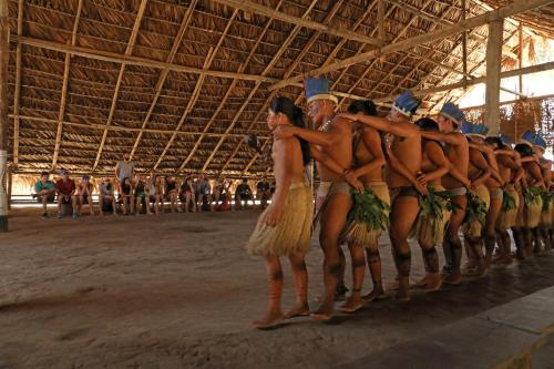 a group of women are standing in a row at Amazon Ecopark Jungle Lodge in Manaus