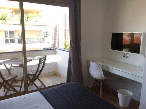 TV a/nebo společenská místnost v ubytování Republica 83 - Campo Pequeno Home