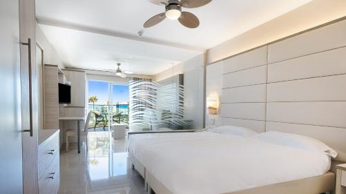 Ένα ή περισσότερα κρεβάτια σε δωμάτιο στο Bull Dorado Beach & SPA