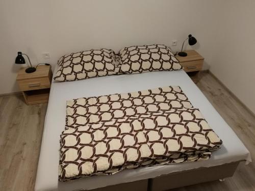 Posteľ alebo postele v izbe v ubytovaní Apartmán Zebra