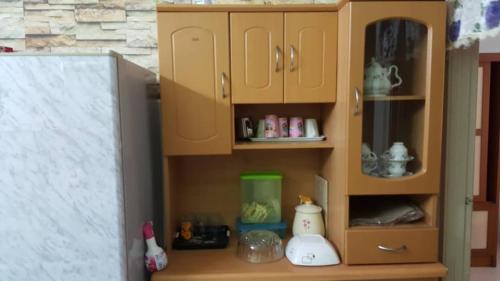 Kuchyň nebo kuchyňský kout v ubytování Homestay De MITC Melaka