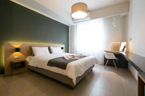 En eller flere senge i et værelse på TONI'S Studio Syntagma, 1 min from Metro station