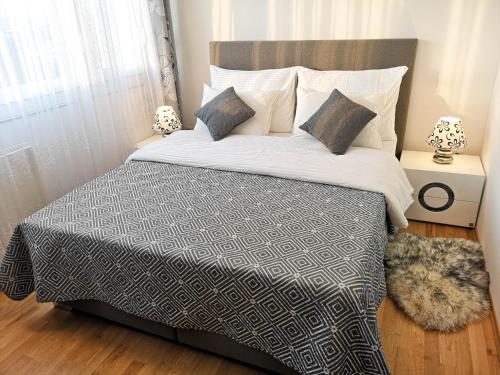 Кровать или кровати в номере Apartment Mia -V