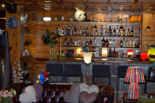 Lounge nebo bar v ubytování Mauberme Mountain Boutique Hotel