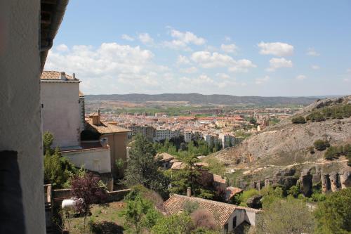 a view of a city from a hill at Hospedería de Cuenca in Cuenca