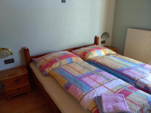 Cama ou camas em um quarto em Haus Andrea