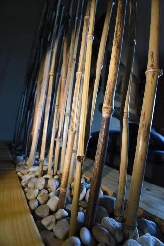 a row of baseball bats lined up in a row at Cheetah Holiday Club in Vizovice