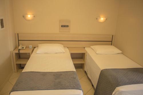 Katil atau katil-katil dalam bilik di San Remo Hotel