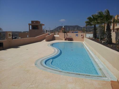 Bazén v ubytování Relax and Quiet Apartment for remote working, with wonderful sea views in Poris de Abona, Tenerife - Canary Islands nebo v jeho okolí