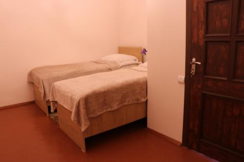 Cama o camas de una habitación en Legend Guest House