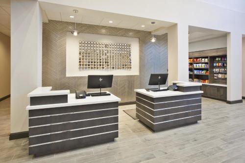 a lobby with two desks with computers on them at Best Western Plus Cranberry-Pittsburgh North in Cranberry Township