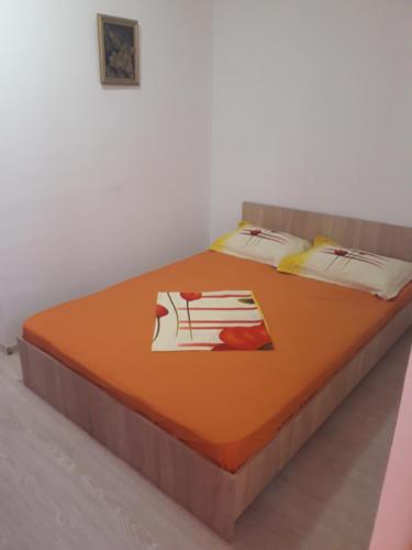 Säng eller sängar i ett rum på Kociu's House
