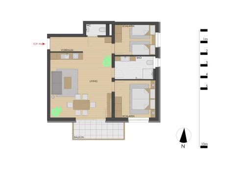 a floor plan of a house with furniture at Echt Woods Appartements in Söll