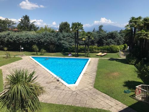 The swimming pool at or close to Green Garda Desenzano