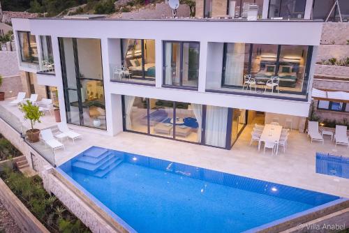 an aerial view of a house with a swimming pool at Villa Anabel in Hvar