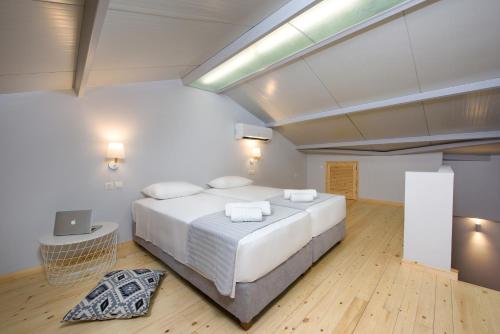Postel nebo postele na pokoji v ubytování La Soffitta